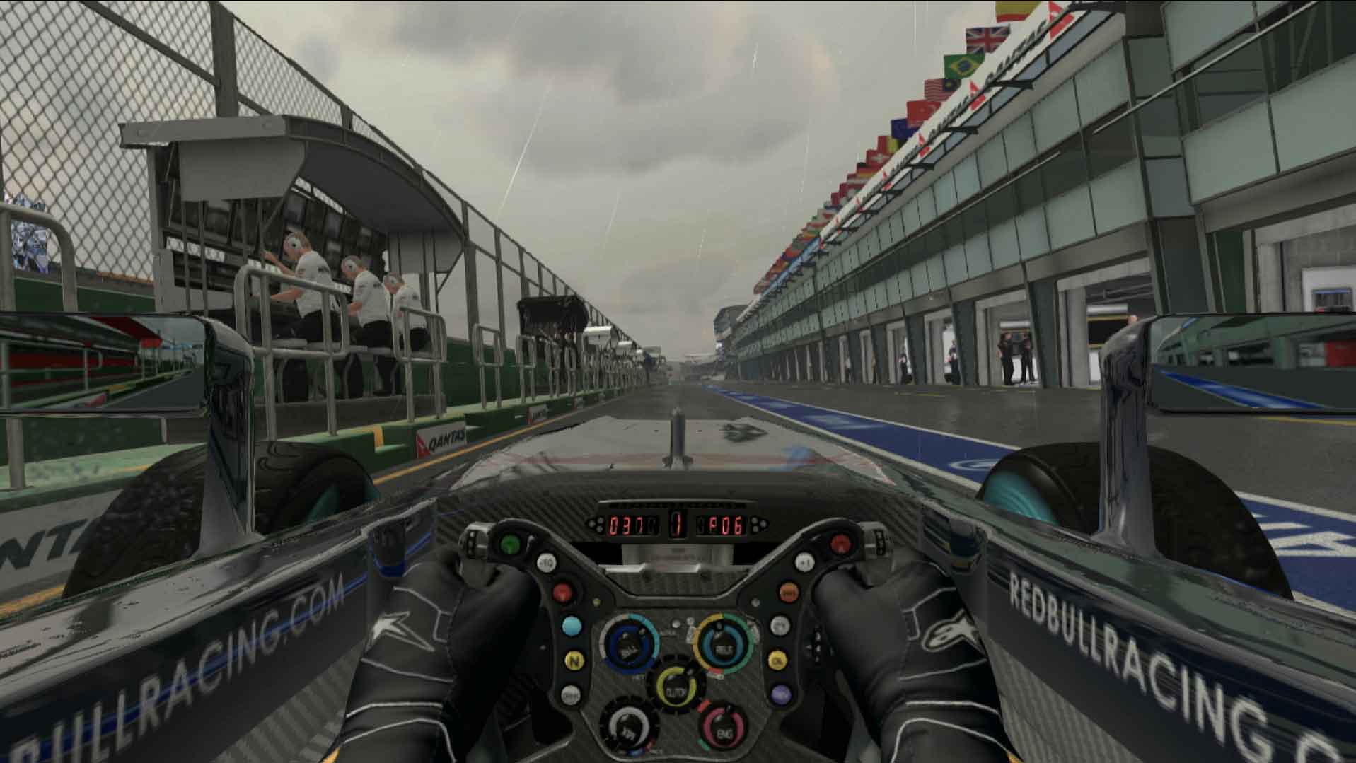 F1 2011 PS3 pit driving raining screenshot