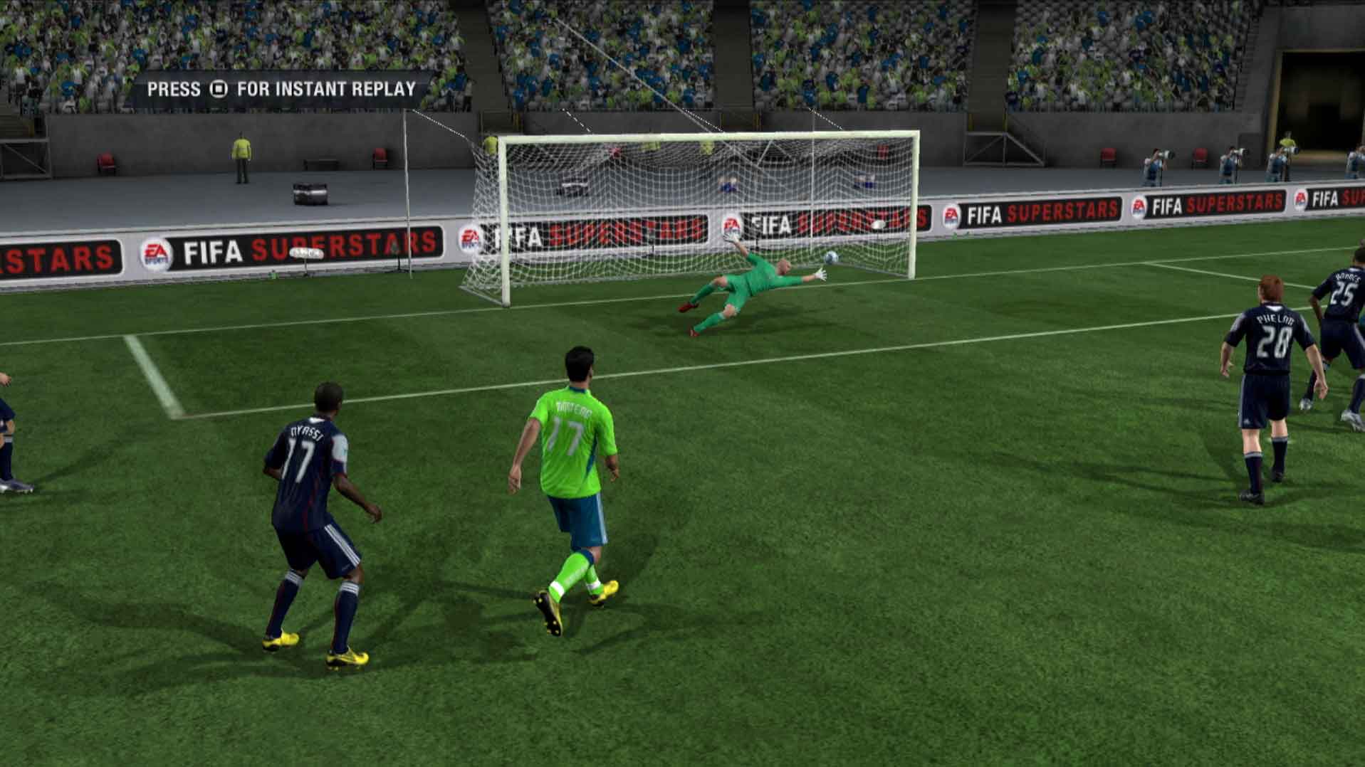 FIFA Soccer 11 PS3 goalie trying save ball