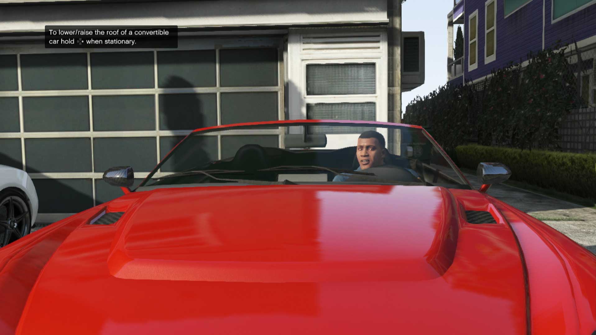 Grand Theft Auto V PS3 Franklin character red sports car