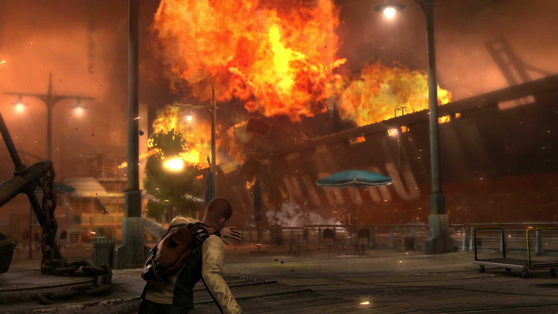 Infamous 2 PS3 city explosion fire screenshot